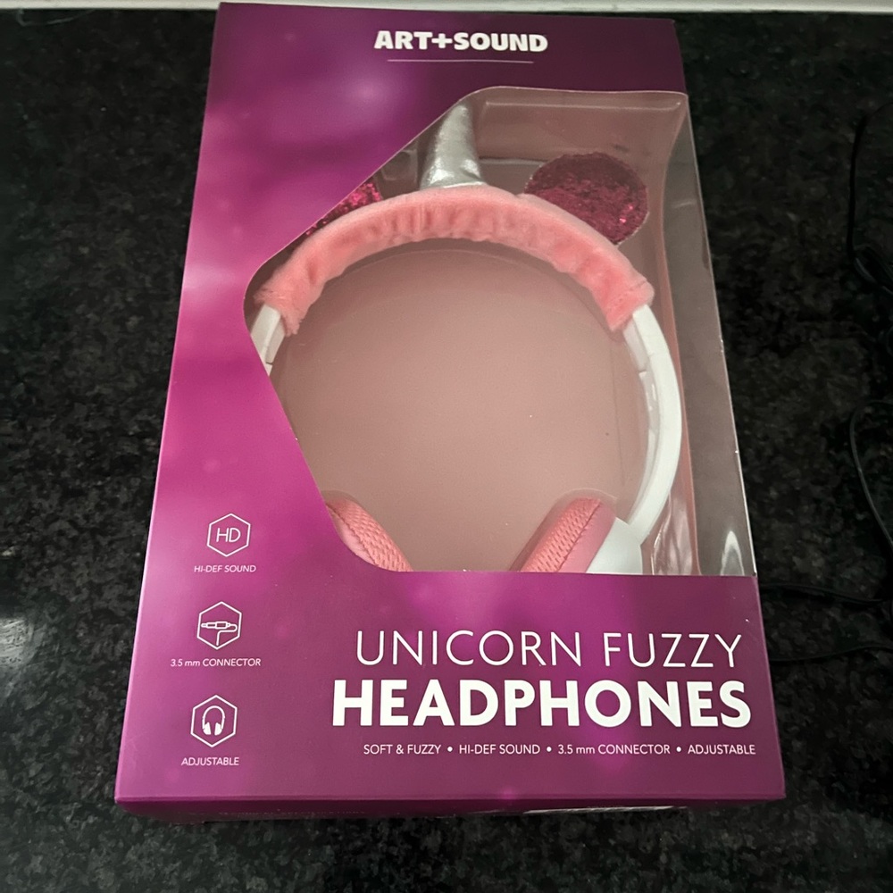 Unicorn pink fuzzy headphones new in sealed box